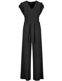 Thumbnail for Taifun Damen Eleganter Jumpsuit mit Chiffon-Blumen überschnittene Schultern, Kurzarm unifarben lang Schwarz 38 im Sale
