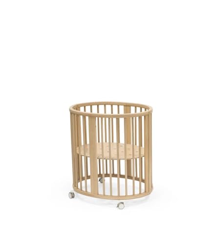 Stokke Sleepi Mini, Natural - Ovales Kinderbett für 0-6 Monate - Höhenverstellbares Gestell, feststellbare Schwenkräder, perforierte Matratzenauflage für Luftzirkulation im Sale