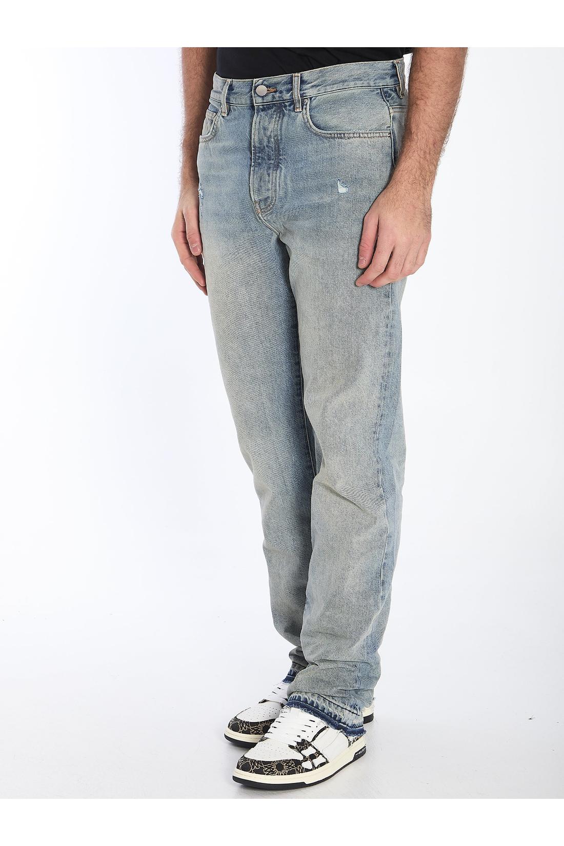 Amiri Released hem jeans im Sale